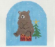 Bear sitting on package